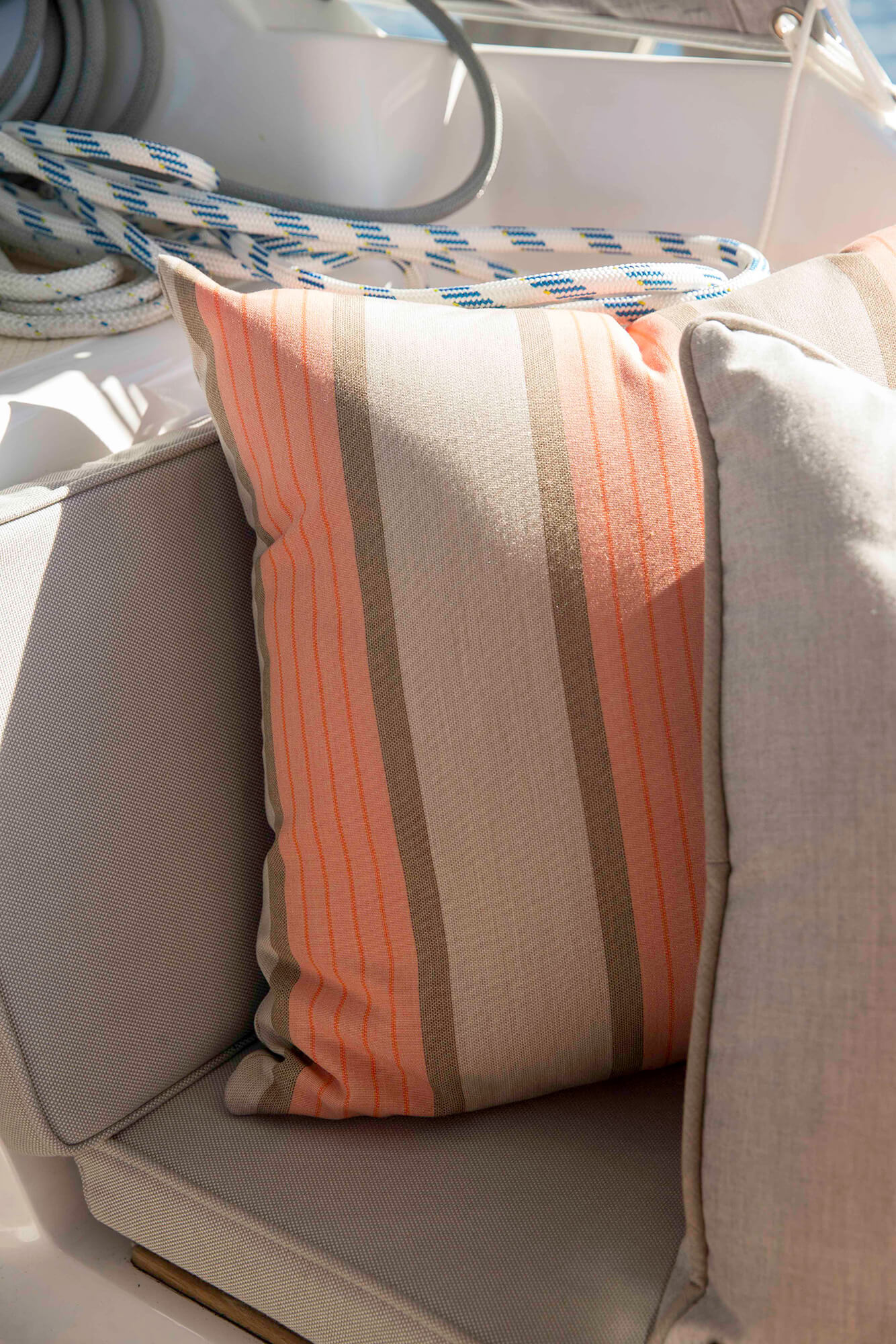 Detail shot of pillow made using Sunbrella Cove Cameo fabric