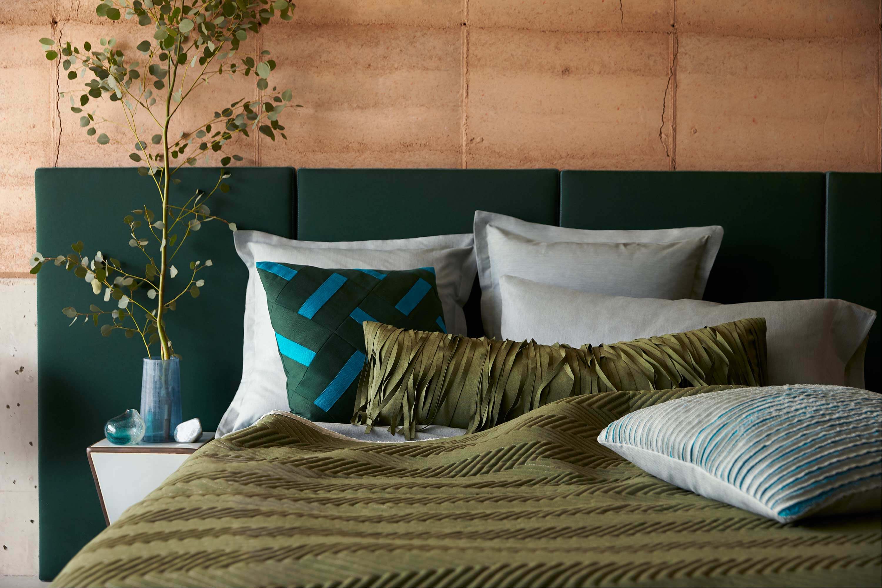 Bedroom with Pillows and Coverlet Bedroom with headboard, plillows and coverlet made with green and teal Sunbrella fabrics